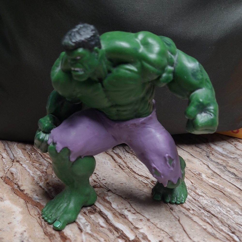 Green and Purple Action Figure